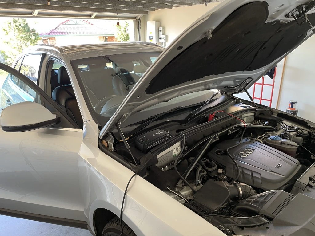 Audi diesel vehicle prepared for on-vehicle DPF servicing